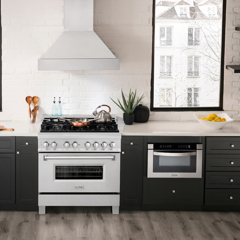 ZLINE 36 in. 4.6 cu. ft. Dual Fuel Range with Gas Stove and Electric Oven in Fingerprint Resistant Stainless Steel (RAS-SN-36) in a luxury-style kitchen with matching appliances.