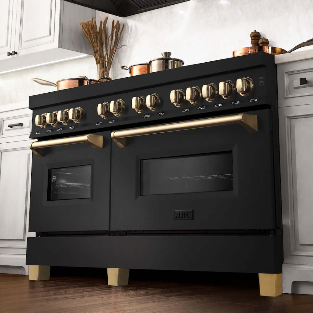 ZLINE Autograph Edition 60 in. 7.4 cu. ft. Dual Fuel Range with Gas Stove and Electric Oven in Black Stainless Steel with Polished Gold Accents (RABZ-60-G) from below in a luxury kitchen with cookware on cooktop.