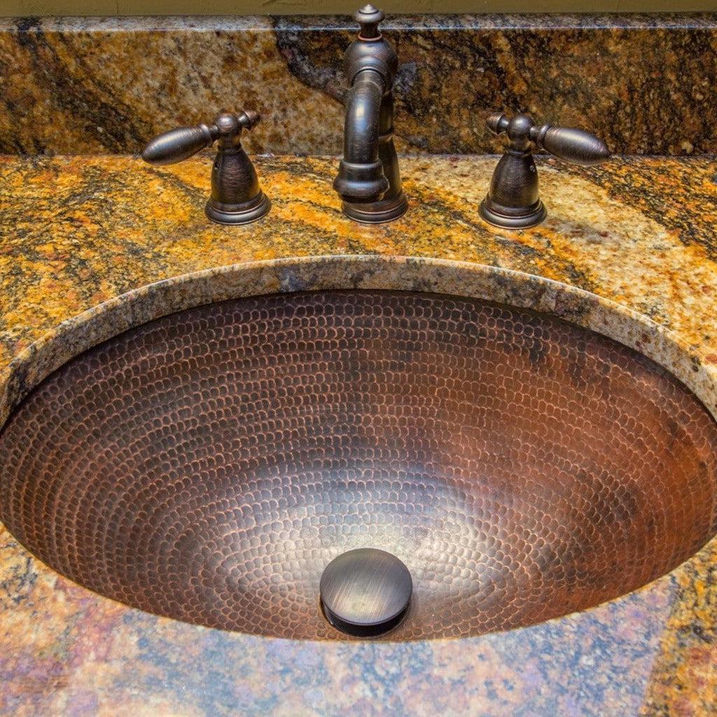 Premier Copper 19 in. Oval Under Counter Hammered Copper Bathroom Sink