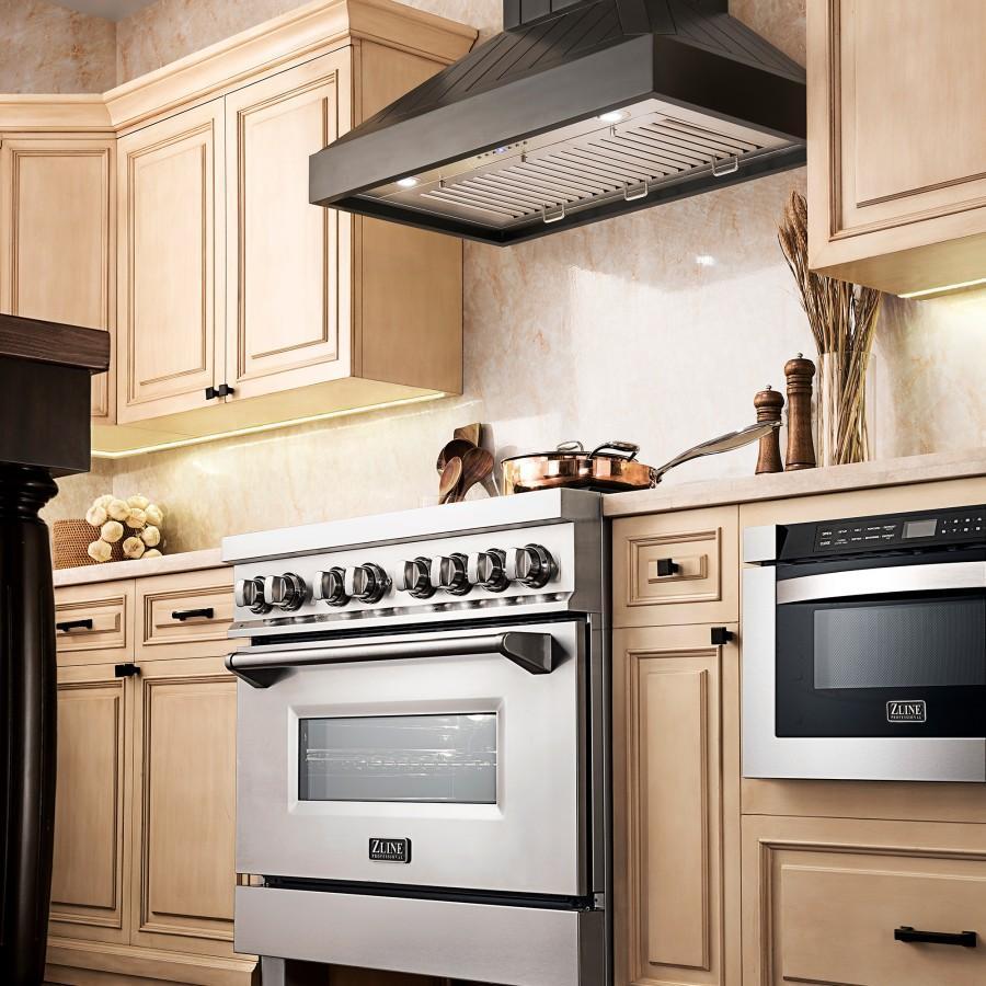 ZLINE Wooden Wall Mount Range Hood In Black in a rustic-style kitchen above a range from side.