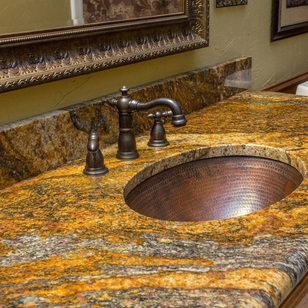 Premier Copper 19 in. Oval Under Counter Hammered Copper Bathroom Sink