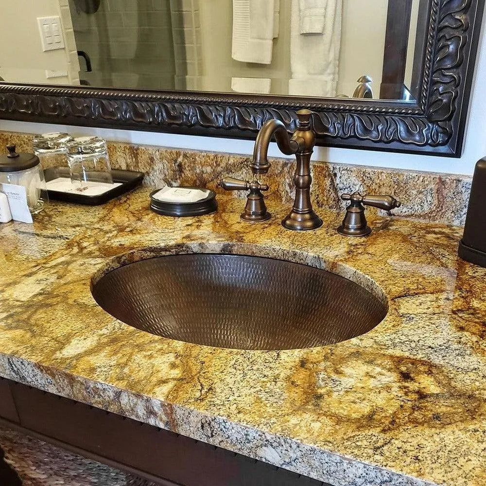 Premier Copper 19 in. Oval Under Counter Hammered Copper Bathroom Sink
