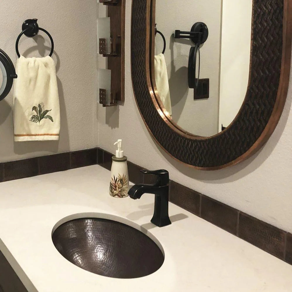 Premier Copper 19 in. Oval Under Counter Hammered Copper Bathroom Sink