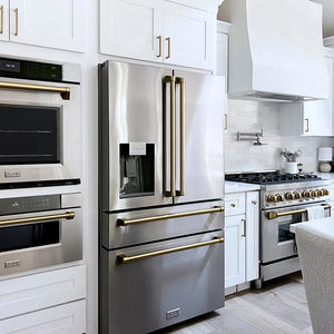 Modern farmhouse kitchen with stainless steel appliances, including a ZLINE Autograph Edition 36 in. 21.6 cu. ft. Counter-Depth French Door Refrigerator with Water and Ice Dispenser in Fingerprint-Resistant Stainless Steel with Champagne Bronze Traditional Handles (RFMZ-W-36-CB), oven, and range.