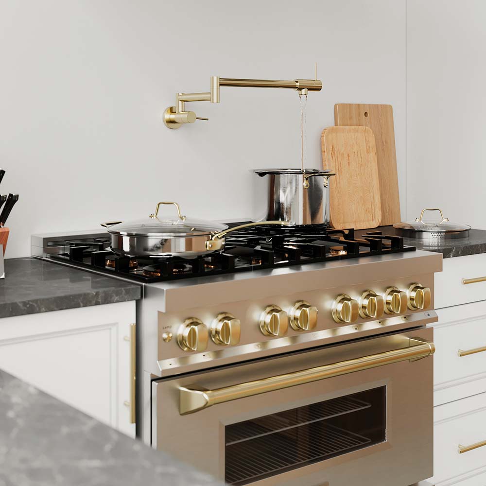 ZLINE Dual Fuel Range with Gold Autograph Edition Handles in a kitchen with cookware on cooktop.