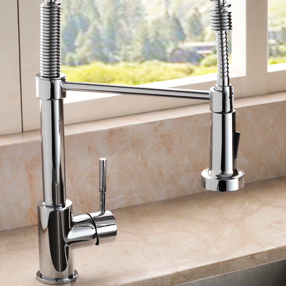 ZLINE Apollo Kitchen Faucet (APL-KF) Chrome on a countertop with a window in the background