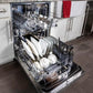 BREDA dishwasher loaded with dishes in kitchen