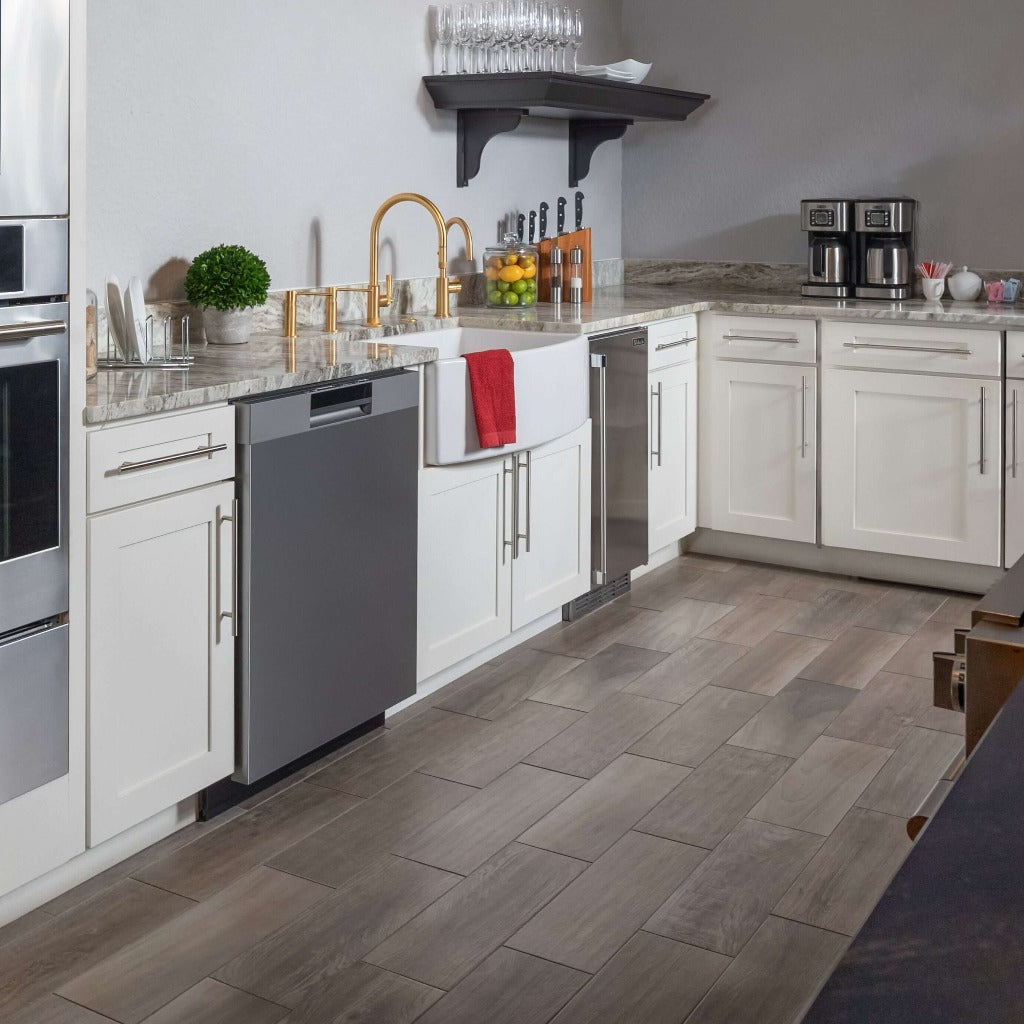 BREDA panel ready dishwasher with a stainless steel panel in a kitchen