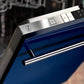 ZLINE 24 in. Blue Gloss Top Control Built-In Dishwasher with Stainless Steel Tub and Modern Style Handle, 52dBa (DW-BG-H-24) close-up, open.