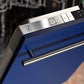 ZLINE 24 in. Blue Matte Top Control Built-In Dishwasher with Stainless Steel Tub and Modern Style Handle, 52dBa (DW-BM-H-24) close up, top controls.