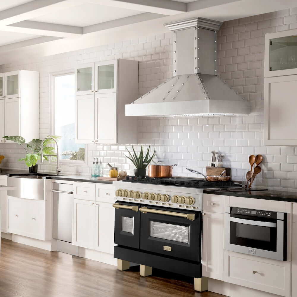 ZLINE Autograph Edition 48 in. 6.0 cu. ft. Legacy Dual Fuel Range with 7 Burner Gas Cooktop and 2 Electric Ovens in Stainless Steel with Black Matte Doors and Champagne Bronze Accents (RAZ-BLM-48-CB) in a luxury kitchen with matching appliances.