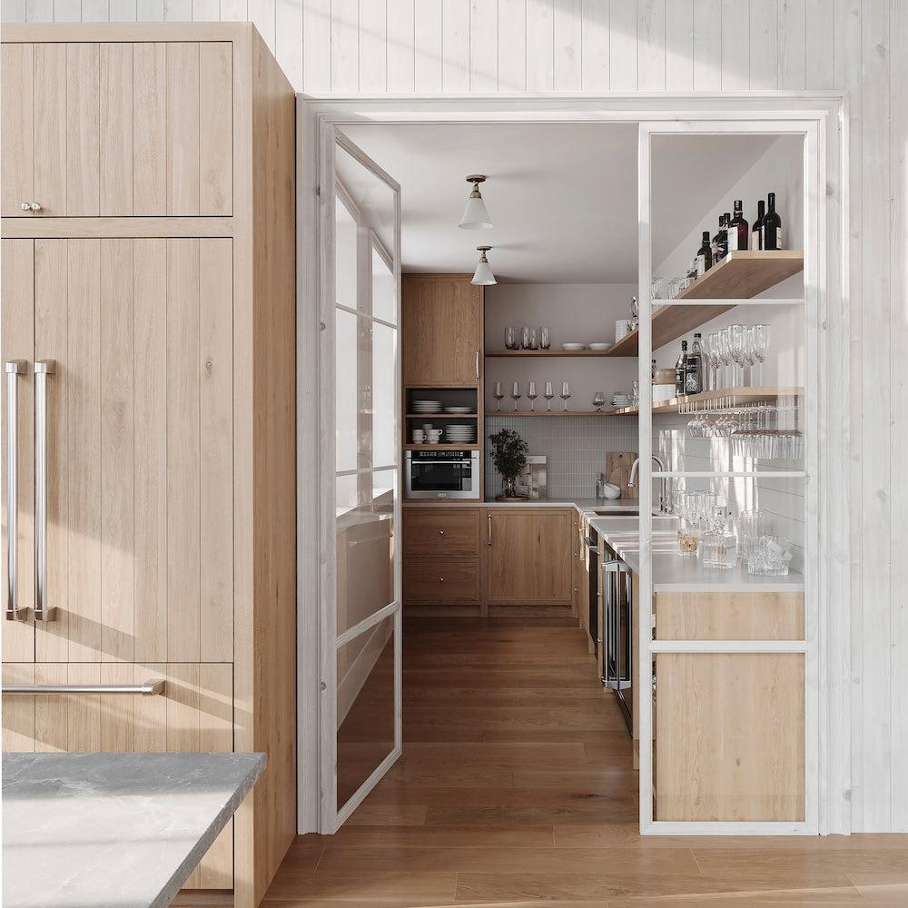 ZLINE 36 in. 19.6 cu. ft. Panel Ready French Door Built-In Bottom Freezer Refrigerator with Water Dispenser and Ice Maker (RBIV-36) next to a butler's pantry with custom wood panels.