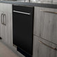 ZLINE 24 in. Black Matte Top Control Built-In Dishwasher with Stainless Steel Tub and Traditional Style Handle, 52dBa (DW-BLM-24) in a modern-style kitchen with grey cabinets and dark countertops.