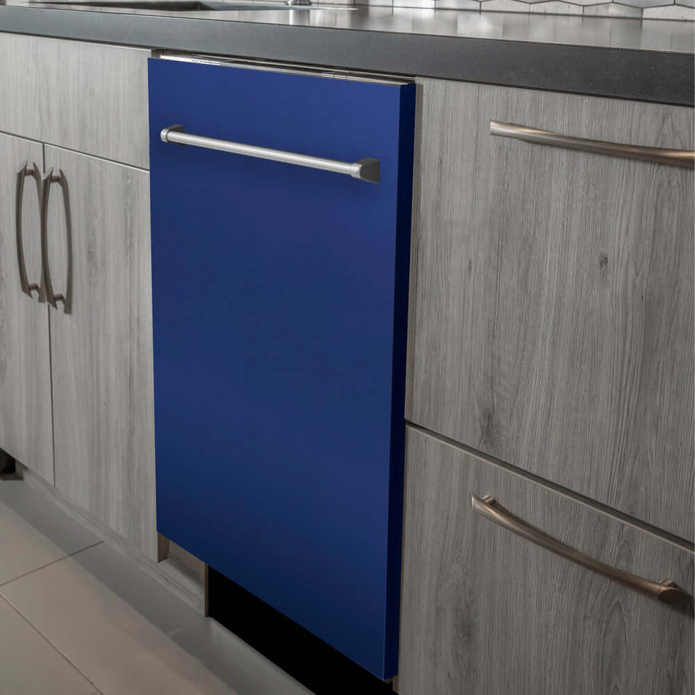 ZLINE 24 in. Blue Matte Top Control Built-In Dishwasher with Stainless Steel Tub and Traditional Style Handle, 52dBa (DW-BM-24) in a modern-style kitchen with grey cabinets and dark countertops.