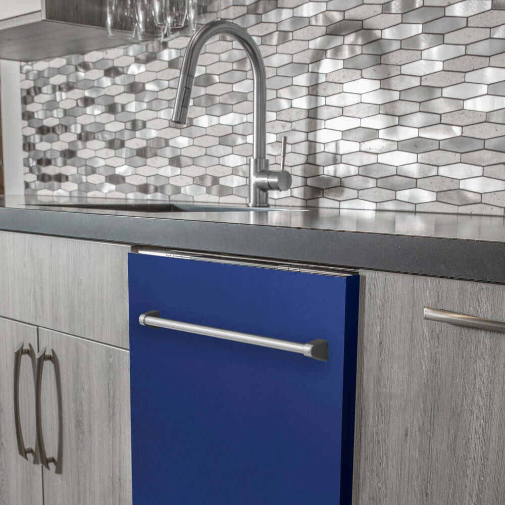 ZLINE 24 in. Blue Matte Top Control Built-In Dishwasher with Stainless Steel Tub and Traditional Style Handle, 52dBa (DW-BM-24) in a modern-style kitchen with grey cabinets and dark countertops.
