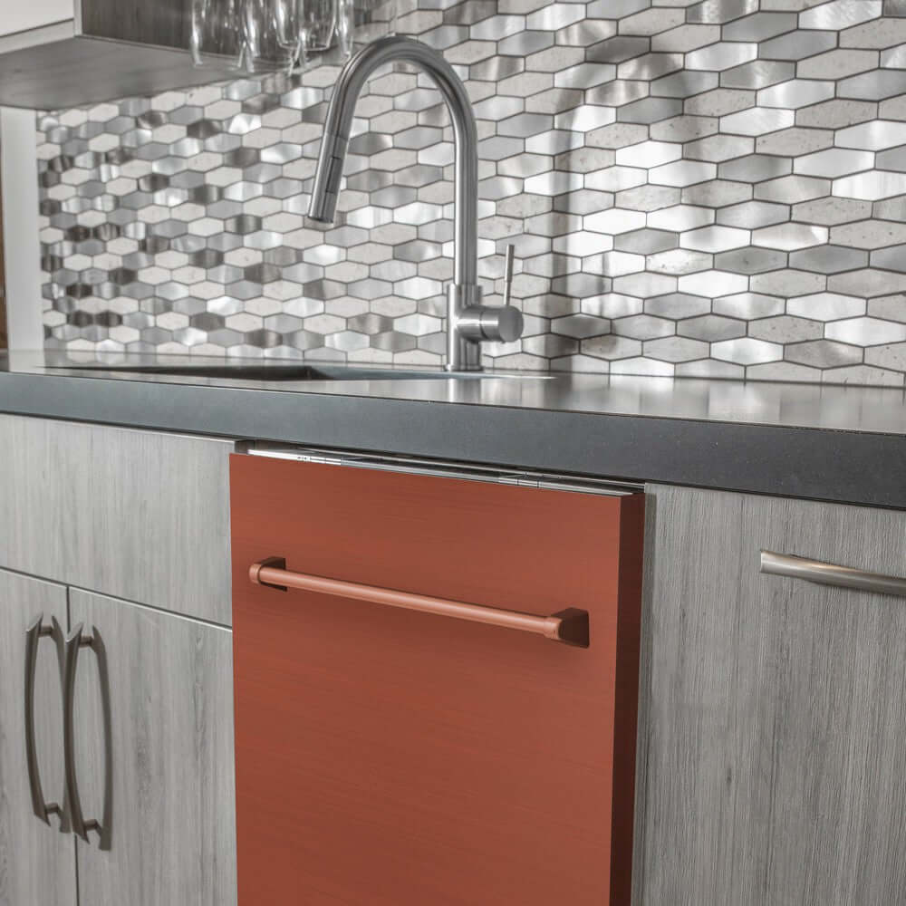 ZLINE 24 in. Copper Top Control Built-In Dishwasher with Stainless Steel Tub and Traditional Style Handle, 52dBa (DW-C-H-24) in a modern-style kitchen with grey cabinets and dark countertops.