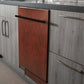ZLINE 24 in. Hand-Hammered Copper Top Control Built-In Dishwasher with Stainless Steel Tub and Modern Style Handle, 52dBa (DW-HH-24) in a modern-style kitchen with grey cabinets and dark countertops.