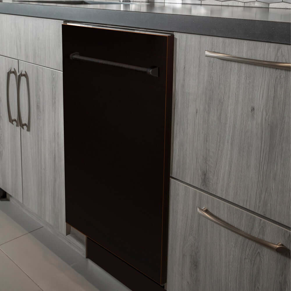 ZLINE 24 in. Oil-Rubbed Bronze Top Control Built-In Dishwasher with Stainless Steel Tub and Traditional Style Handle, 52dBa (DW-ORB-H-24) in a modern-style kitchen with grey cabinets and dark countertops.