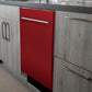 ZLINE 24 in. Red Gloss Top Control Built-In Dishwasher with Stainless Steel Tub and Traditional Style Handle, 52dBa (DW-RG-24) in a modern-style kitchen with grey cabinets and dark countertops.