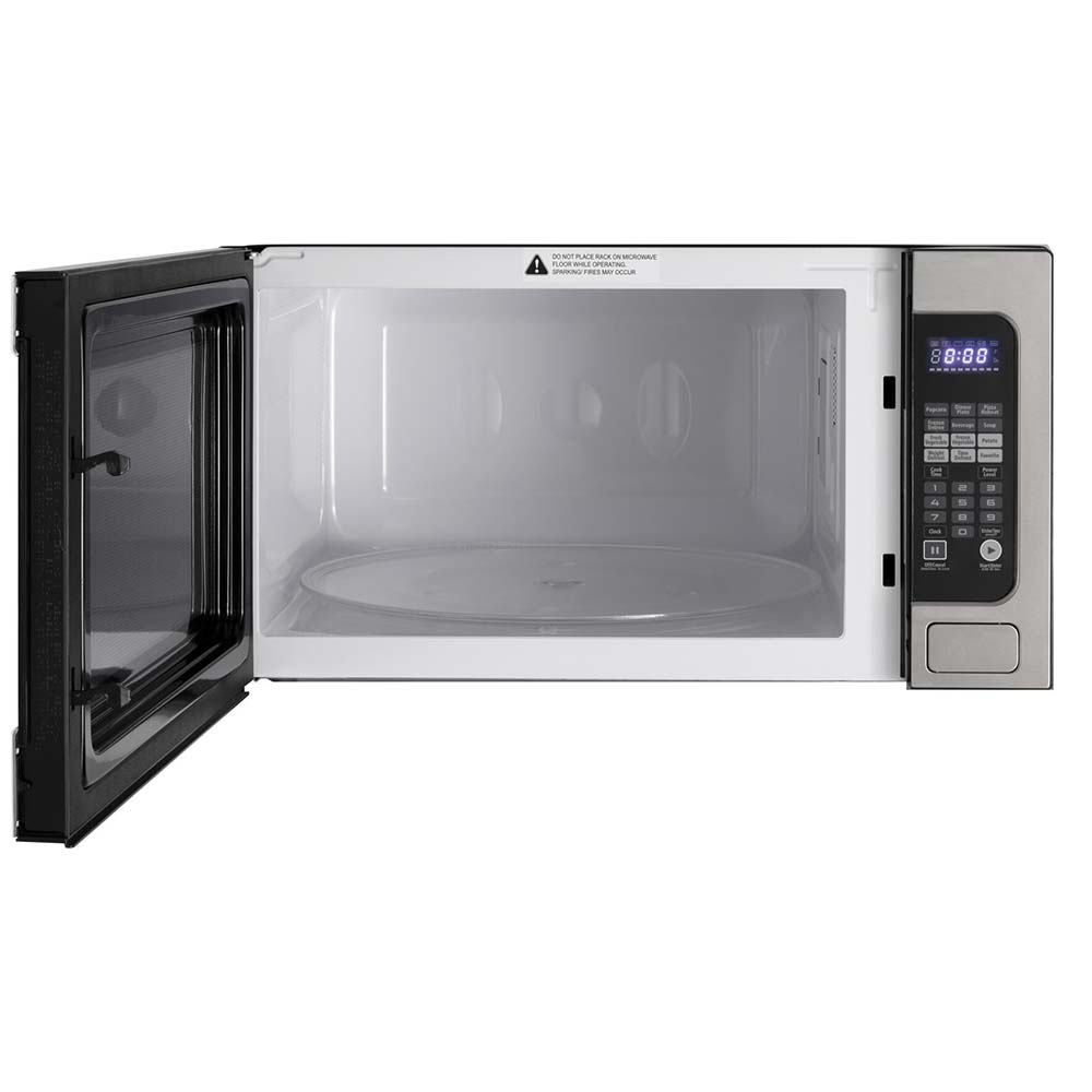 Forté 24 in. 2.2 cu. ft. Countertop Microwave in Stainless Steel front with door open.