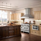 ZLINE stainless steel appliances in wooden farmhouse kitchen.