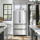 Forno Moena 36 in. 19 cu. ft. French Door Counter Depth Refrigerator in Stainless Steel (FFRBI1820-36SB) in a modern kitchen with large windows.