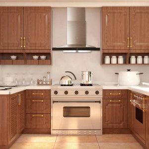 A modern kitchen interior with medium brown wooden cabinets, a Fotile Perimeter Vent Series 36 in. 900 CFM Wall Mount Range Hood with Touchscreen in Stainless Steel (EMS9018), built-in gas oven, countertop cookware, and white ceramic jars on open and shelf cabinets.