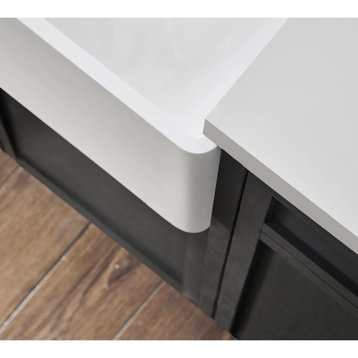 Kingston Brass Arcticstone 33 in. Solid Surface White Stone Apron-Front Double Bowl Farmhouse Kitchen Sink with Strainers in Matte/Glossy White (GPFA331810BCD) corner