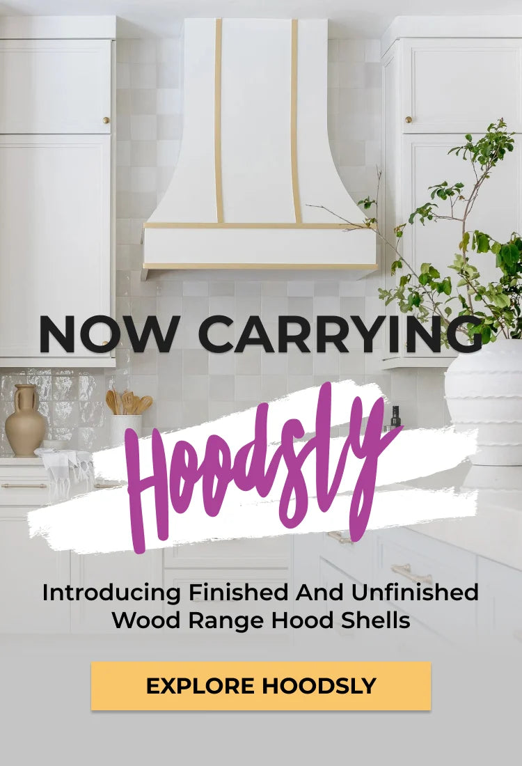 Promotional graphic for Hoodsly showing a white kitchen range hood with gold trim in a bright kitchen setting, with text reading 'NOW CARRYING HOODSLY' and 'Introducing Finished And Unfinished Wood Range Hood Shells'. Button: Explore Hoodsly.