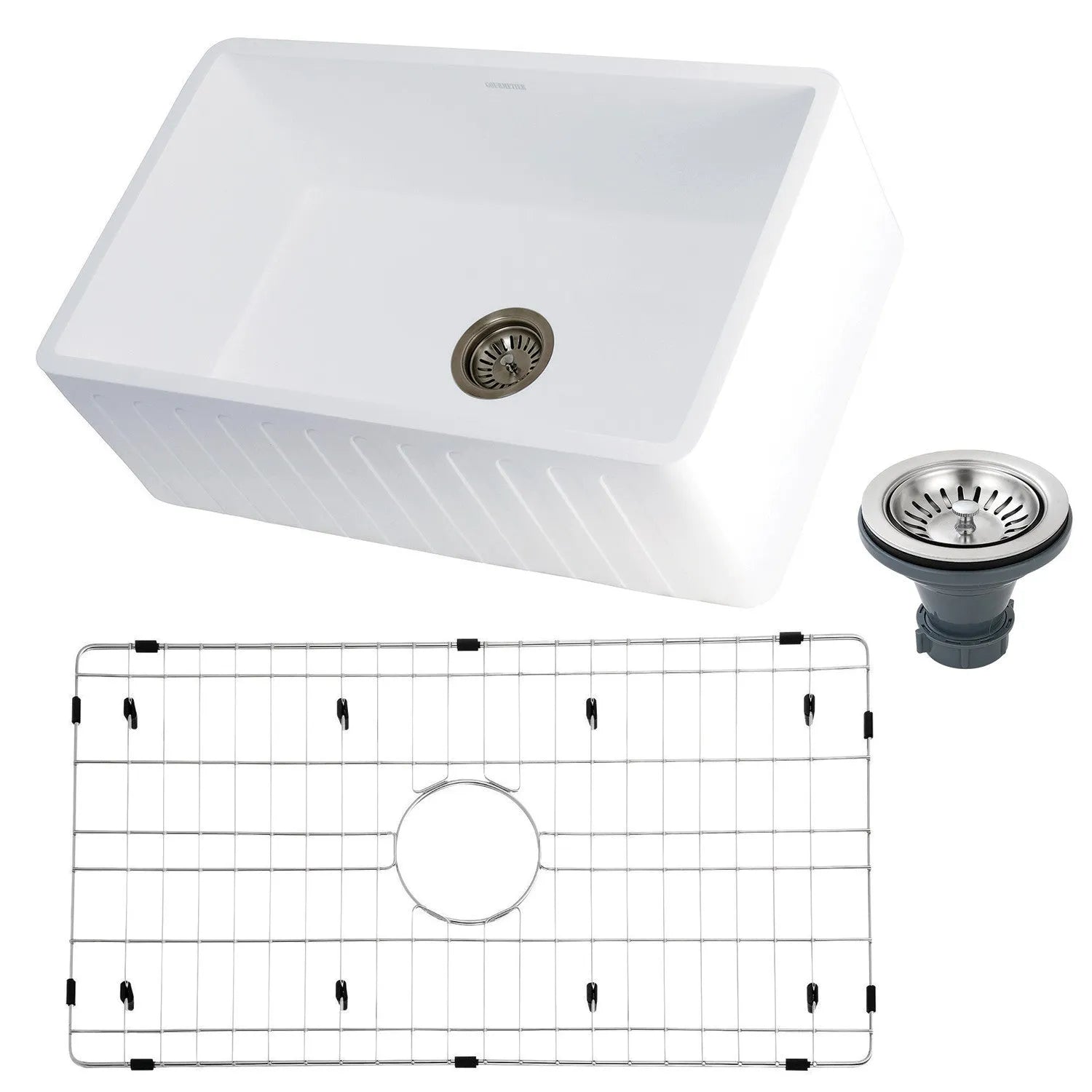 White kitchen sink with grid and drain on a white background