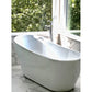 Kingston Brass English Country Freestanding Tub Faucet with Hand Shower (KS7131ABL) Polished Chrome above a white freestanding bathtub in a bathroom with large windows and greenery outside.