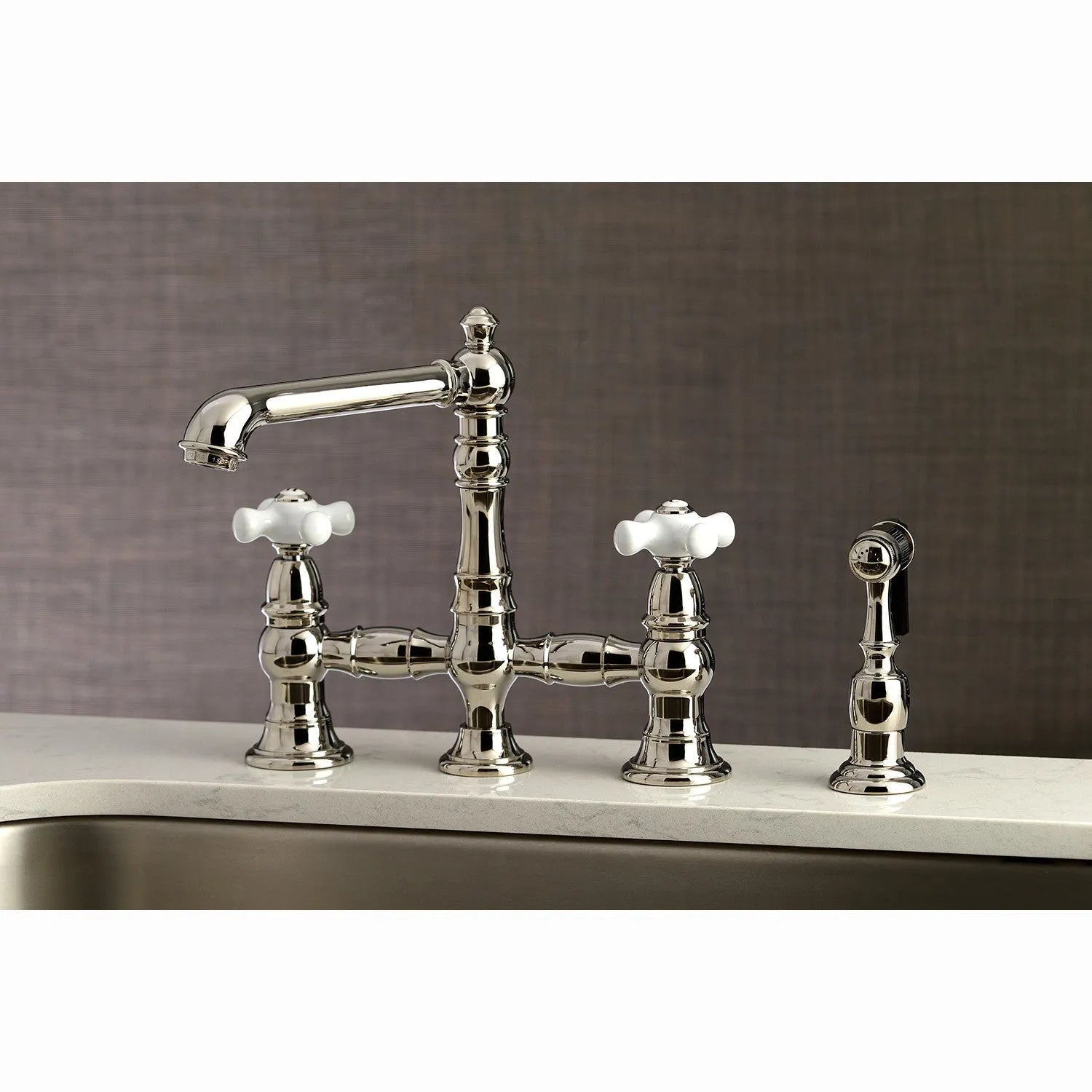 Kingston Brass English Country 8" Bridge Kitchen Faucet with Sprayer (KS7276PXBS) Polished Nickel