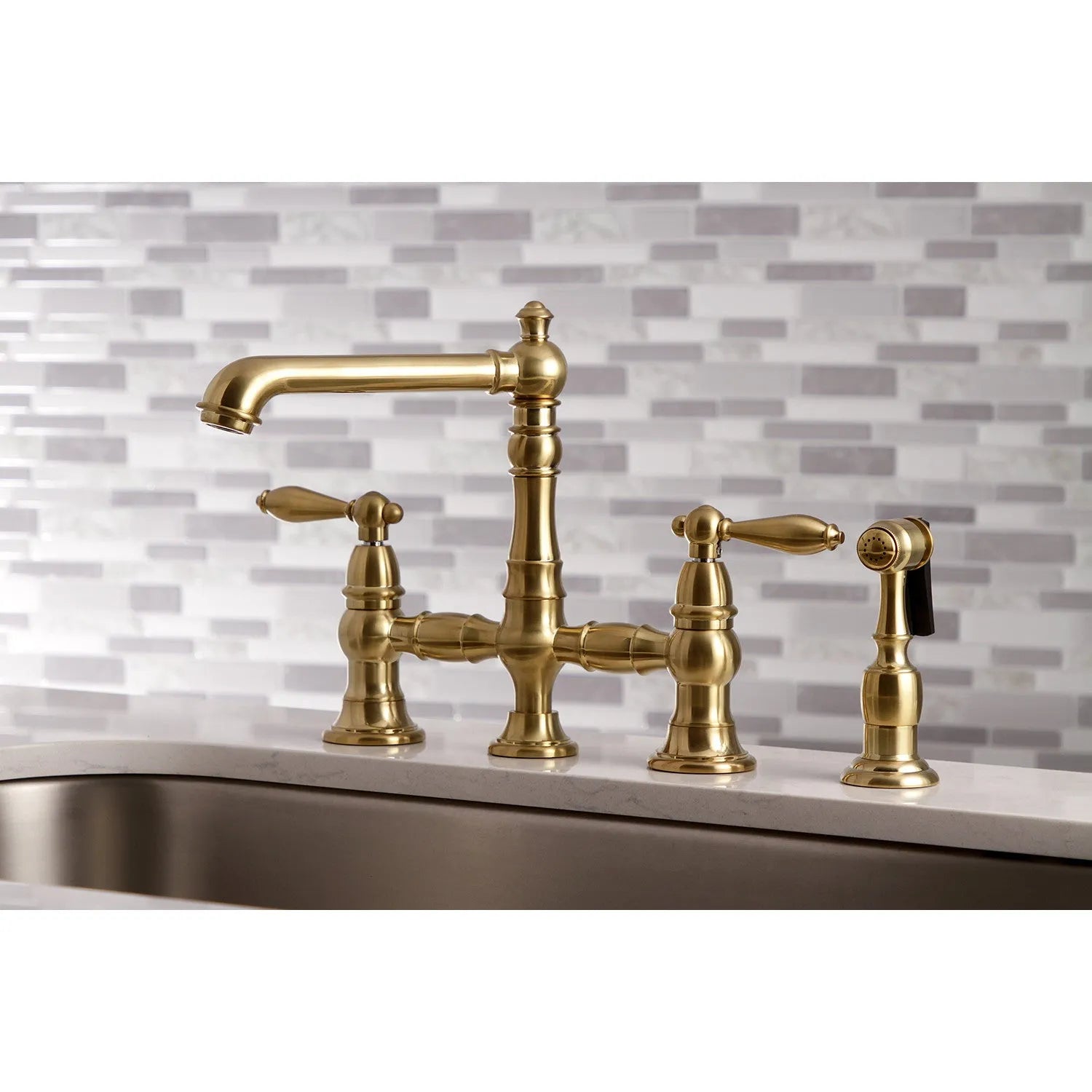 Kingston Brass Deck Mount Bridge Kitchen Faucet with Side Sprayer
