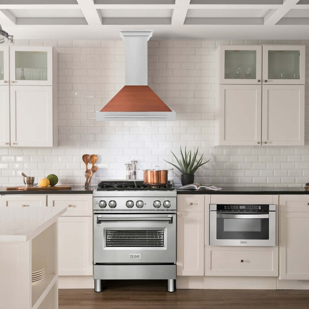 ZLINE Convertible Stainless Steel Range Hood with Copper Shell and Stainless Steel Handle with Size Options (KB4STX-C) in a farmhouse-style kitchen.
