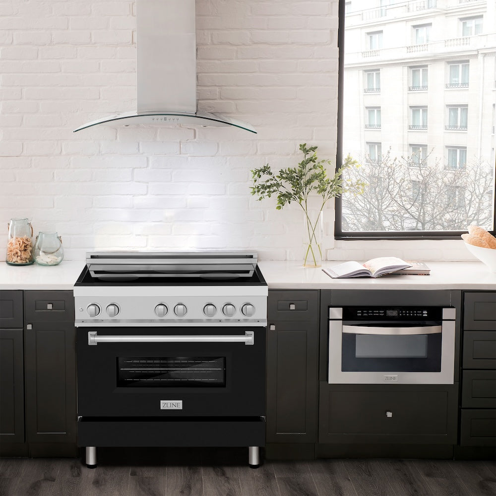 ZLINE 36 in. 4.6 cu. ft. Induction Range with a 5 Element Stove and Electric Oven in Black Matte (RAIND-BLM-36) in a luxury-style kitchen with matching appliances.