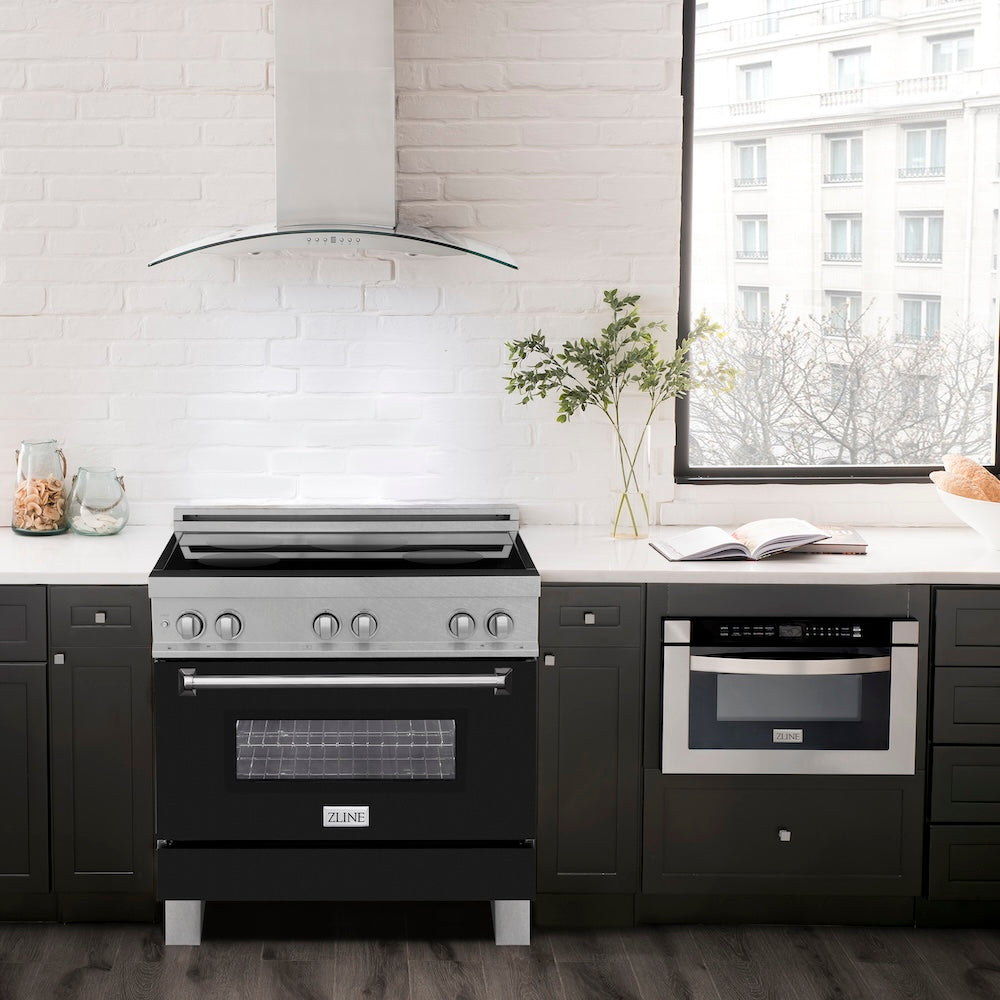 ZLINE 36 in. 4.6 cu. ft. Induction Range with a 5 Element Stove and Electric Oven in Black Matte (RAINDS-BLM-36) in a luxury-style kitchen with matching appliances.