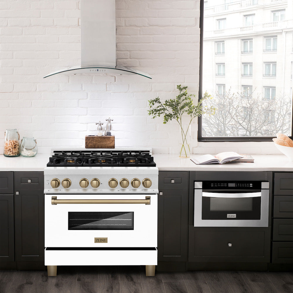 ZLINE Autograph Edition 36 in. 4.6 cu. ft. Dual Fuel Range with Gas Stove and Electric Oven in Fingerprint Resistant Stainless Steel with White Matte Door and Champagne Bronze Accents (RASZ-WM-36-CB) in a luxury-style kitchen with matching appliances.