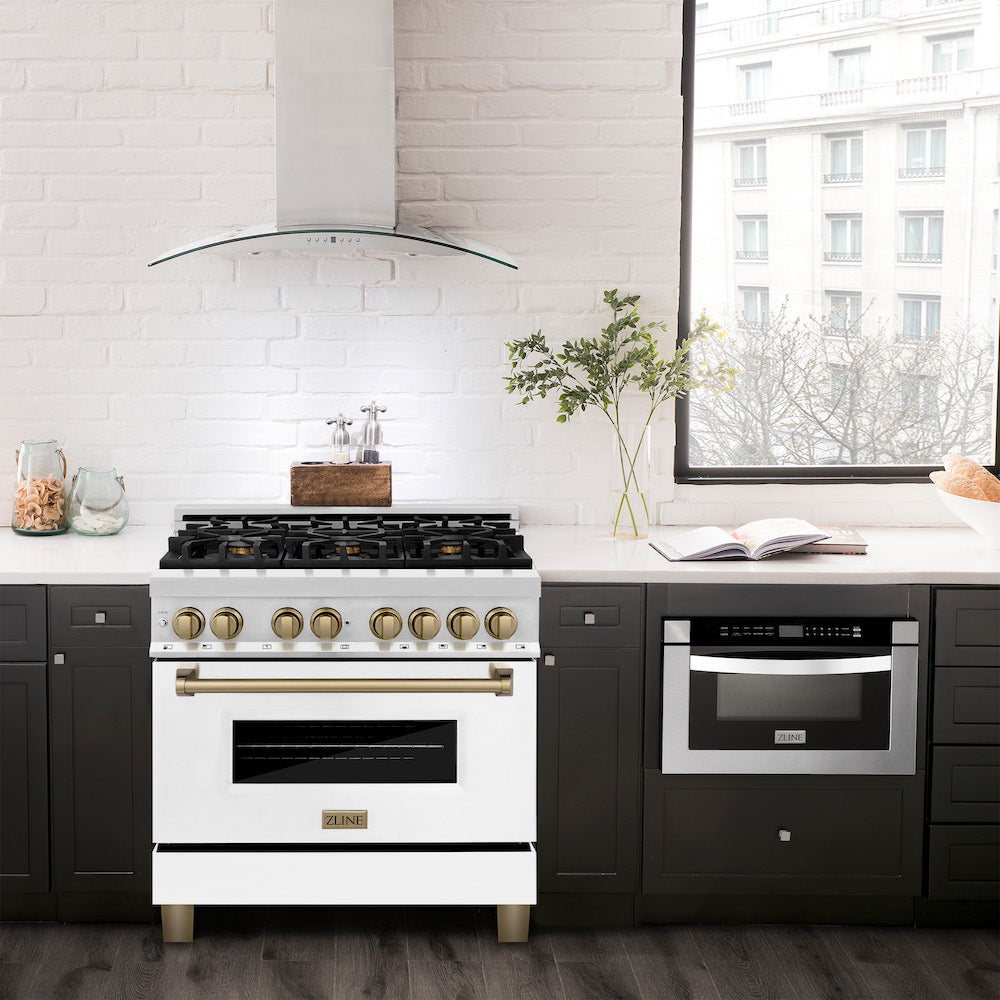 ZLINE Autograph Edition 36 in. 4.6 cu. ft. Dual Fuel Range with Gas Stove and Electric Oven in Stainless Steel with White Matte Door and Champagne Bronze Accents (RAZ-WM-36-CB) in a luxury-style kitchen with matching appliances.
