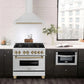 ZLINE Autograph Edition 36 in. Stainless Steel Range Hood with Stainless Steel Shell and Accents (KB4STZ-36) in modern luxury apartment kitchen above matching range.