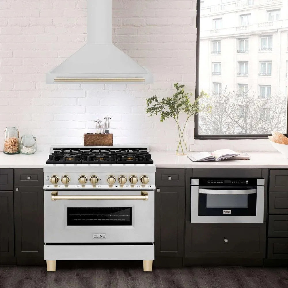 ZLINE Autograph Edition 36 in. Stainless Steel Range Hood with Stainless Steel Shell and Accents (KB4STZ-36) in modern luxury apartment kitchen above matching range.