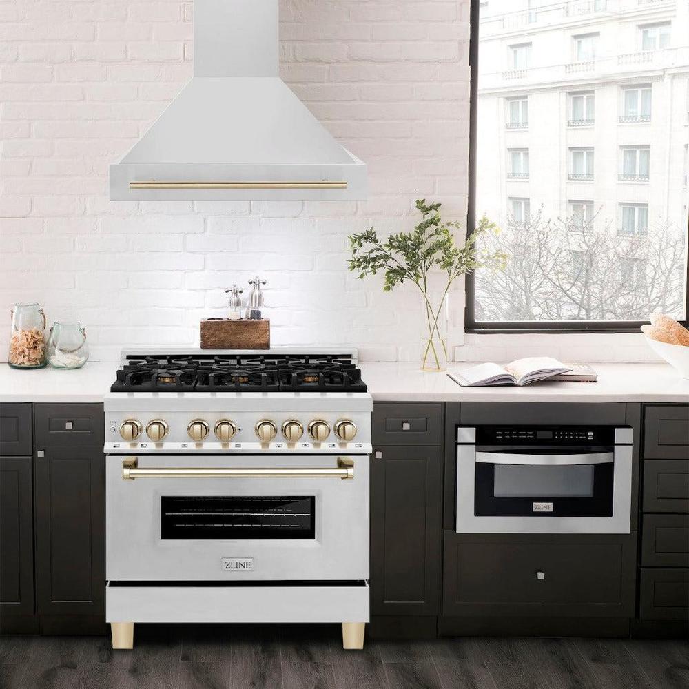 ZLINE Autograph Edition 36 in. Stainless Steel Range Hood with Stainless Steel Shell and Handle (8654STZ-36) in modern luxury apartment kitchen above matching range.