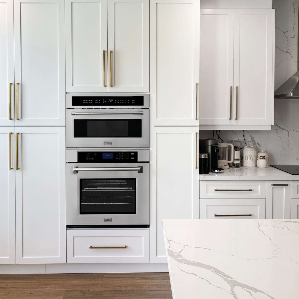 ZLINE Wall Oven and Microwave Oven stacked together in a farmhouse-style kitchen with white cabinets.