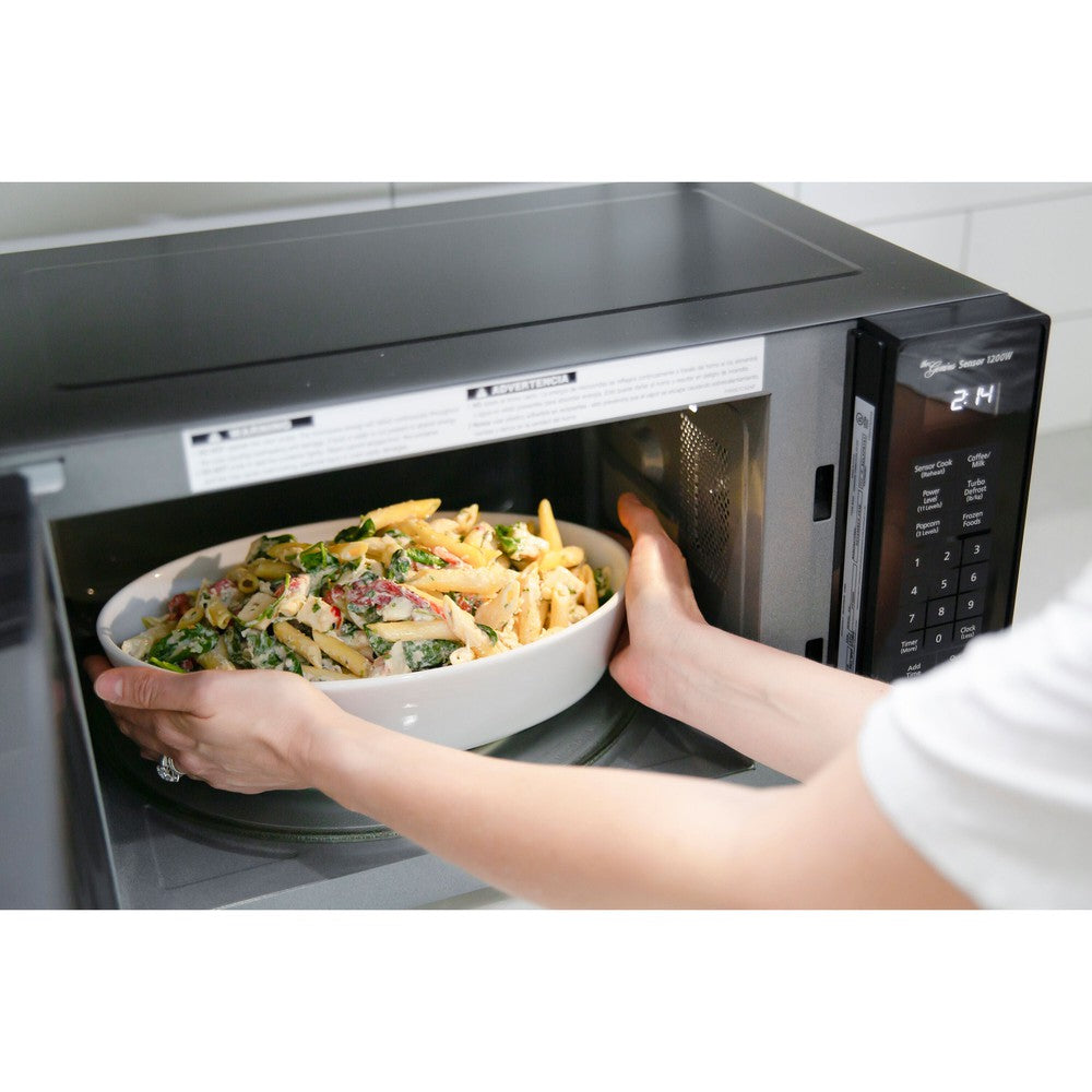 Panasonic 1.2 cu. ft. 1200W Genius Sensor Countertop Microwave Oven with Inverter Technology in Black (NN-SN66KB) 