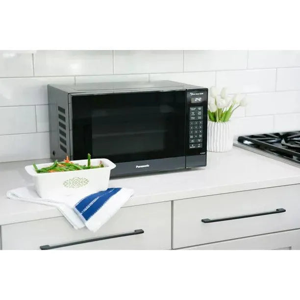 Panasonic 1.2 cu. ft. 1200W Genius Sensor Countertop Microwave Oven with Inverter Technology in Black (NN-SN66KB) 