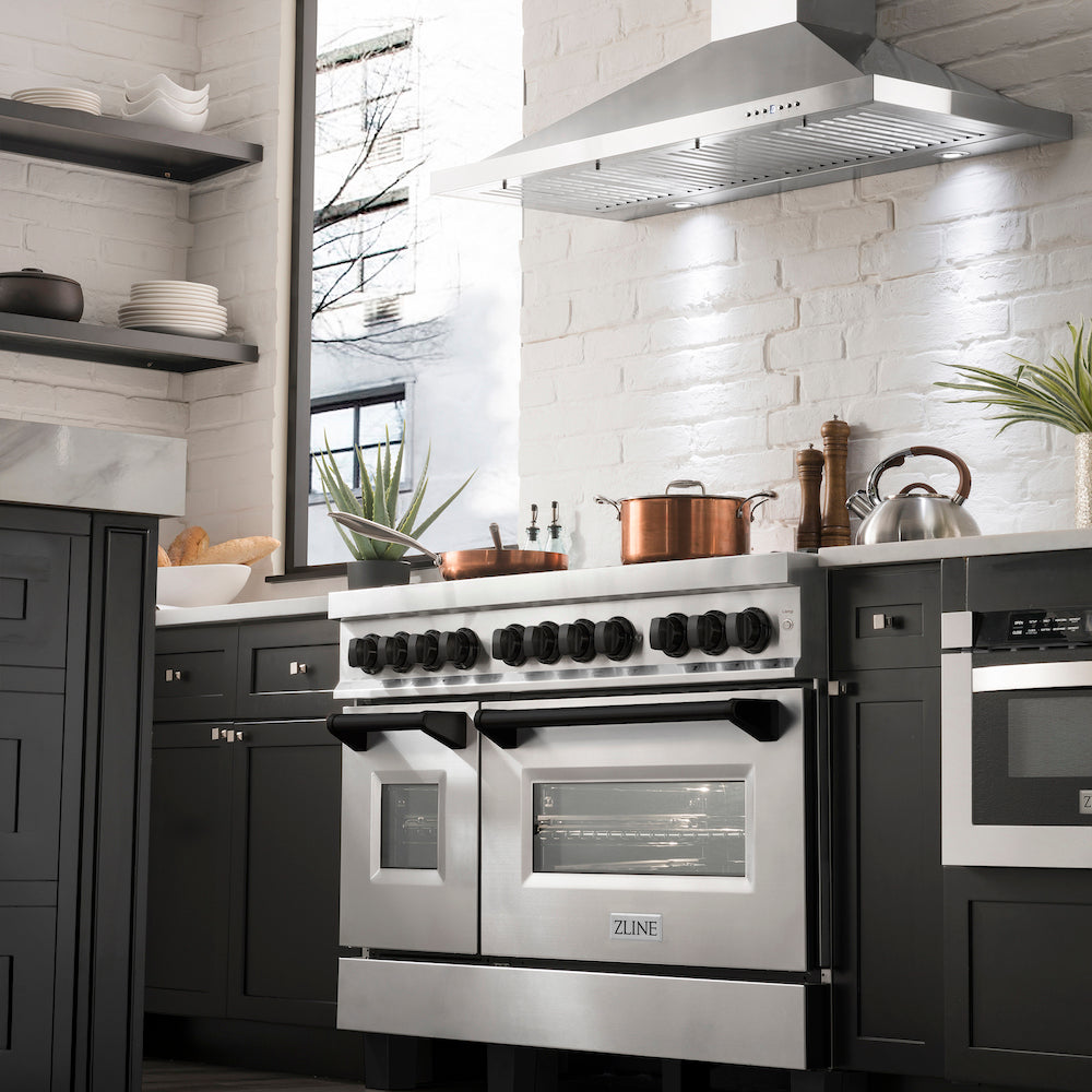 ZLINE Autograph Edition 48 in. 6.0 cu. ft. Legacy Dual Fuel Range with 7 Burner Gas Cooktop and 2 Electric Ovens in Stainless Steel and Matte Black Accents (RAZ-48-MB) in a luxury modern-style kitchen from below.