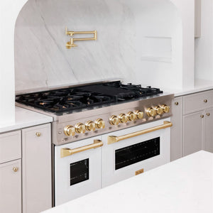 ZLINE Autograph Edition 48 in. 6.0 cu. ft. Legacy Dual Fuel Range with 7 Burner Gas Cooktop and 2 Electric Ovens in Stainless Steel with White Matte Doors and Polished Gold Accents (RAZ-WM-48-G) in a kitchen  with gold fixtures against a white backsplash
