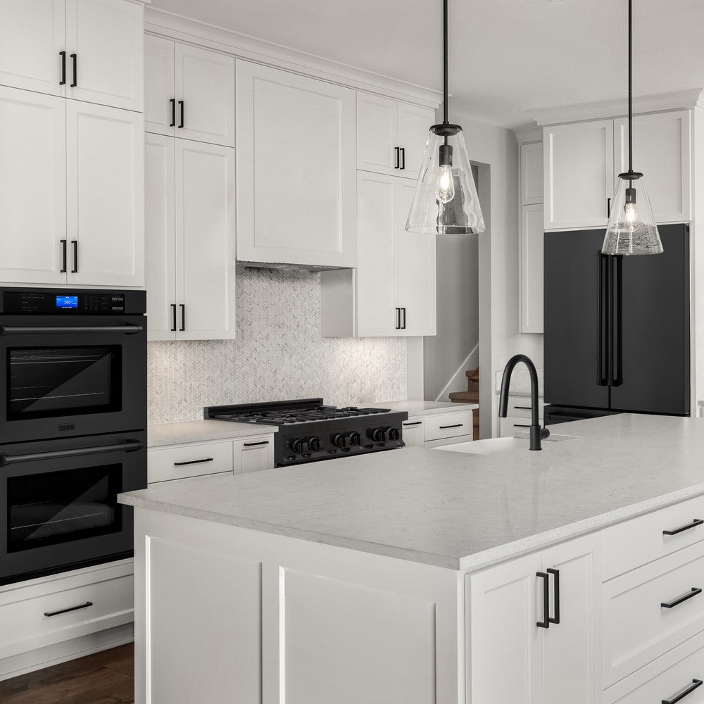 ZLINE black stainless steel kitchen appliances in a white luxury kitchen with white marble counters.