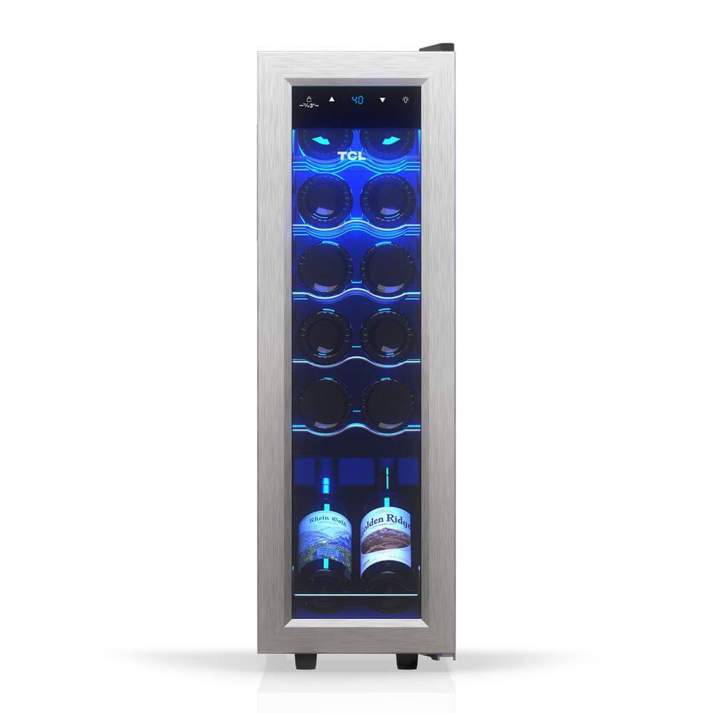 TCL 18 in. 12 Bottle 1.24 Cu. Ft. Compact Freestanding Wine Cooler with Glass Door (TRW12F6AS) with blue interior light displaying wine bottles on a white background