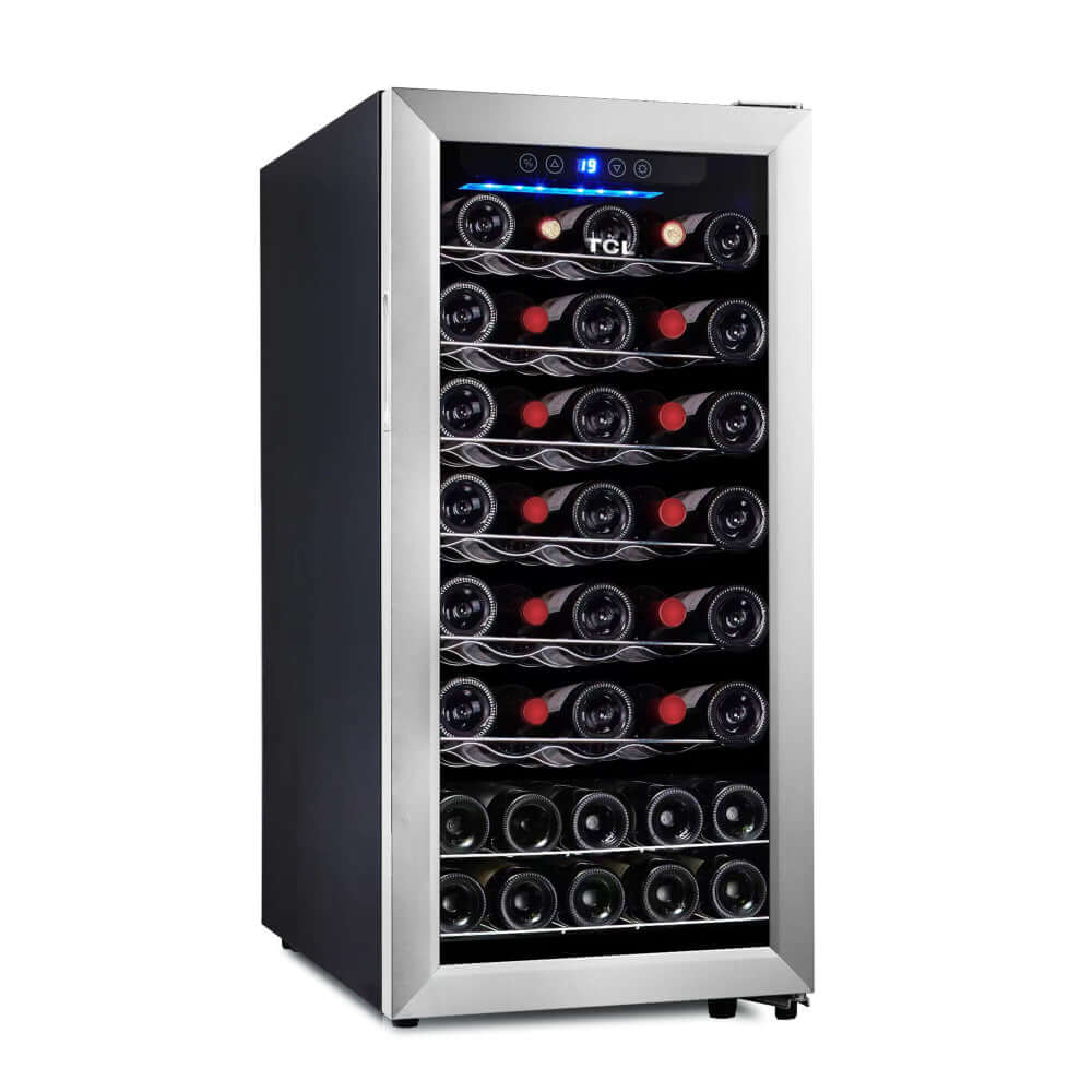 TCL 16 in. 38 Bottle 3.4 Cu. Ft. Compact Wine Cooler with Glass Door (TRW38F6AS) with multiple wine bottles inside on a white background