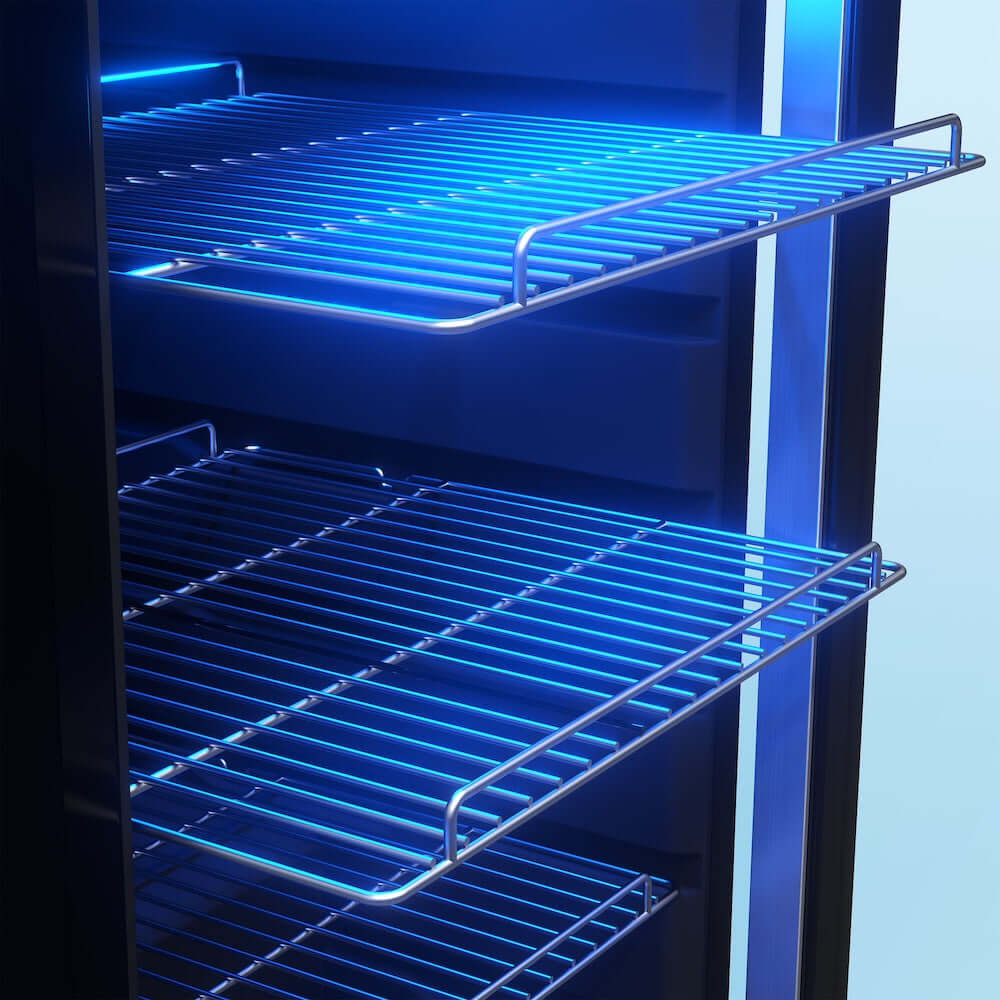 Shelves inside a TCL 18 in. 121 Can 2.4 Cu. Ft. Compact Freestanding Beverage Cooler with Glass Door (TRV121FAS) with blue lighting